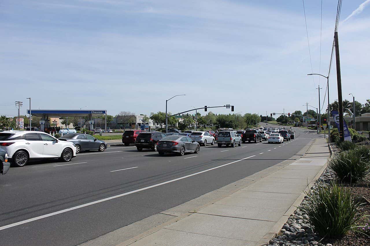Antelope Road on a clear afternoon, the shopping frontage and the traffic lights at Elverta